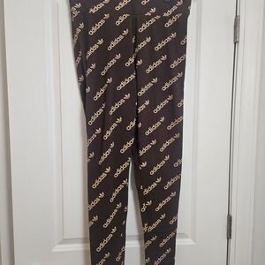 Adidas Black Leggings with Gold Logo Pattern
